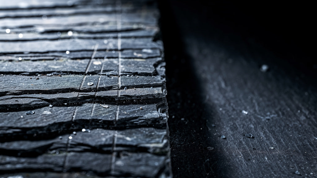 Wet split Welsh slate in low raking light